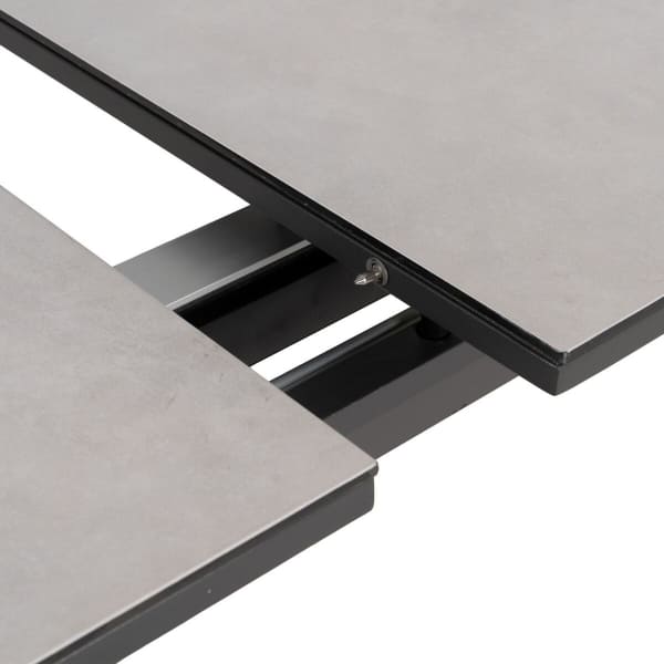 Mesa de comedor extensible de cerámica y metal negro